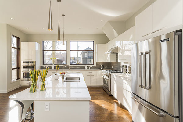 modern kitchen featuring a spacious island and sleek stainless steel appliances